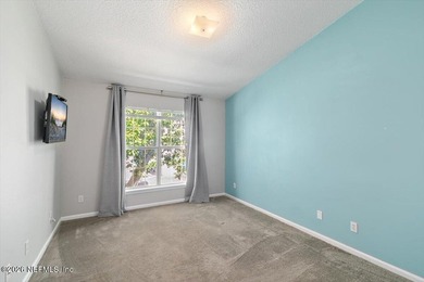 Welcome to 37 Jardin De Mer, a light-filled 2nd-floor condo on Jacksonville Beach Golf Course in Florida - for sale on GolfHomes.com, golf home, golf lot