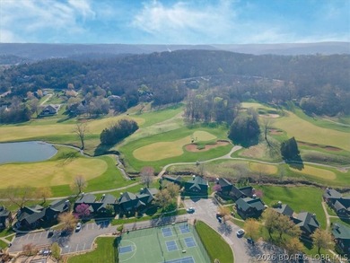 Enjoy this beautifully updated cottage at one of the best golf on The Club At Old Kinderhook in Missouri - for sale on GolfHomes.com, golf home, golf lot
