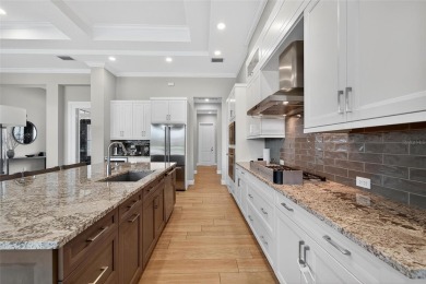 Discover a truly stunning Arthur Rutenberg home in the esteemed on Grasslands Golf and Country Club in Florida - for sale on GolfHomes.com, golf home, golf lot