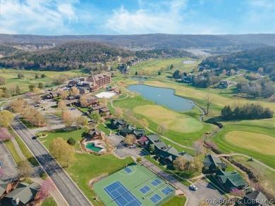 Enjoy this beautifully updated cottage at one of the best golf on The Club At Old Kinderhook in Missouri - for sale on GolfHomes.com, golf home, golf lot