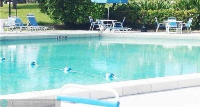 Exclusive 2 Bed/2 Bath Condo; Immerse yourself in tranquility on Inverrary Country Club in Florida - for sale on GolfHomes.com, golf home, golf lot