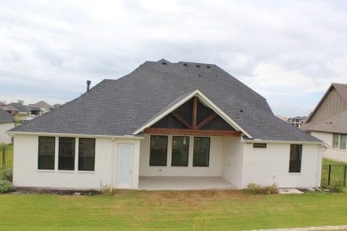 Excellent Value!! Lots of living space, natural lighting-windows on The Golf Club at Resort Eagle Mountain Lake in Texas - for sale on GolfHomes.com, golf home, golf lot