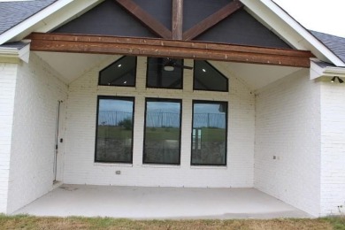 Excellent Value!! Lots of living space, natural lighting-windows on The Golf Club at Resort Eagle Mountain Lake in Texas - for sale on GolfHomes.com, golf home, golf lot