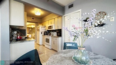 Exclusive 2 Bed/2 Bath Condo; Immerse yourself in tranquility on Inverrary Country Club in Florida - for sale on GolfHomes.com, golf home, golf lot
