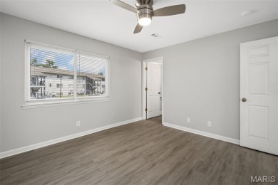 This lovely converted 2 bedroom, 2 bath condo has all you've on Lake Saint Louis Par 3 in Missouri - for sale on GolfHomes.com, golf home, golf lot