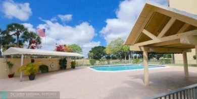 Exclusive 2 Bed/2 Bath Condo; Immerse yourself in tranquility on Inverrary Country Club in Florida - for sale on GolfHomes.com, golf home, golf lot