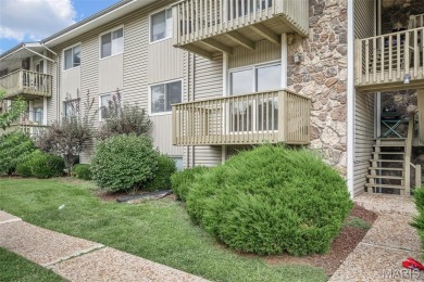 This lovely converted 2 bedroom, 2 bath condo has all you've on Lake Saint Louis Par 3 in Missouri - for sale on GolfHomes.com, golf home, golf lot