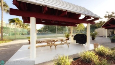 Exclusive 2 Bed/2 Bath Condo; Immerse yourself in tranquility on Inverrary Country Club in Florida - for sale on GolfHomes.com, golf home, golf lot