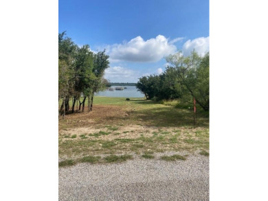 Large corner lot at the intersection of Feather Bay Blvd and on Hideout Golf Club and Resort  in Texas - for sale on GolfHomes.com, golf home, golf lot