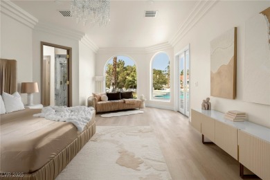 This architectural masterpiece in double guard-gated Spanish on Spanish Trail Golf and Country Club in Nevada - for sale on GolfHomes.com, golf home, golf lot