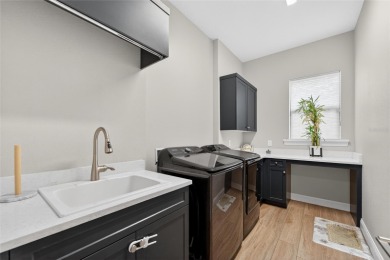 Discover a truly stunning Arthur Rutenberg home in the esteemed on Grasslands Golf and Country Club in Florida - for sale on GolfHomes.com, golf home, golf lot