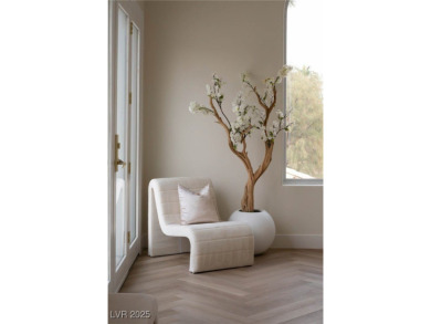 This architectural masterpiece in double guard-gated Spanish on Spanish Trail Golf and Country Club in Nevada - for sale on GolfHomes.com, golf home, golf lot