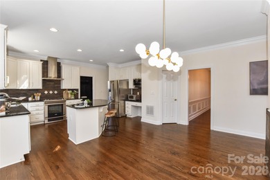 Welcome to this spacious and beautifully updated all brick home on Highland Creek Golf Club in North Carolina - for sale on GolfHomes.com, golf home, golf lot