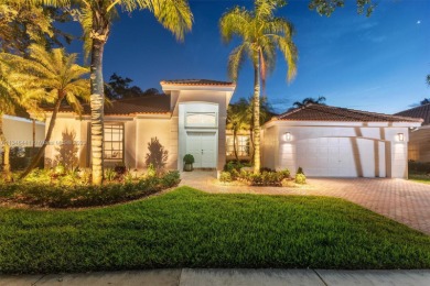 Beautiful one story home that is ready to move in with on Weston Hills Country Club in Florida - for sale on GolfHomes.com, golf home, golf lot