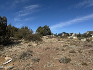 Vacant lot great for a new home build located in beautiful on Snowflake Municipal Golf Course in Arizona - for sale on GolfHomes.com, golf home, golf lot