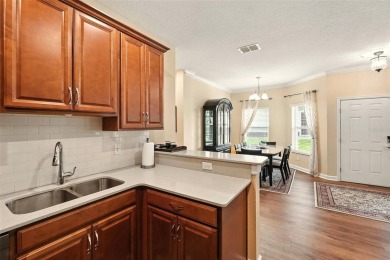 Experience Florida living in the beautiful 55+ gated Heritage on Kings Ridge Golf Club in Florida - for sale on GolfHomes.com, golf home, golf lot
