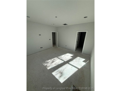 Enjoy easy living in this single-story, 1,754 sq ft on Carolina Trace Country Club in North Carolina - for sale on GolfHomes.com, golf home, golf lot