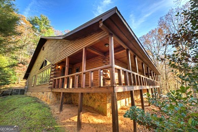 Welcome to an One-of-a-Kind Dovetail Log Home in Buckhorn on White Path Golf Club in Georgia - for sale on GolfHomes.com, golf home, golf lot
