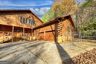Welcome to an One-of-a-Kind Dovetail Log Home in Buckhorn on White Path Golf Club in Georgia - for sale on GolfHomes.com, golf home, golf lot