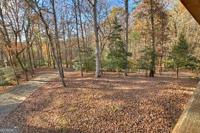 Welcome to an One-of-a-Kind Dovetail Log Home in Buckhorn on White Path Golf Club in Georgia - for sale on GolfHomes.com, golf home, golf lot
