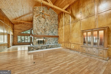 Welcome to an One-of-a-Kind Dovetail Log Home in Buckhorn on White Path Golf Club in Georgia - for sale on GolfHomes.com, golf home, golf lot
