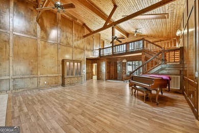 Welcome to an One-of-a-Kind Dovetail Log Home in Buckhorn on White Path Golf Club in Georgia - for sale on GolfHomes.com, golf home, golf lot