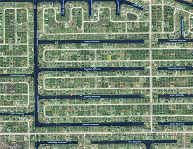 Across from the water located in the very special community of on Rotonda Golf and Country Club - Long Marsh  in Florida - for sale on GolfHomes.com, golf home, golf lot