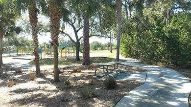 Across from the water located in the very special community of on Rotonda Golf and Country Club - Long Marsh  in Florida - for sale on GolfHomes.com, golf home, golf lot