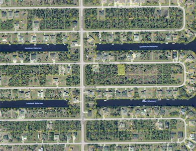 Across from the water located in the very special community of on Rotonda Golf and Country Club - Long Marsh  in Florida - for sale on GolfHomes.com, golf home, golf lot