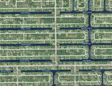 Across from the water located in the very special community of on Rotonda Golf and Country Club - Long Marsh  in Florida - for sale on GolfHomes.com, golf home, golf lot