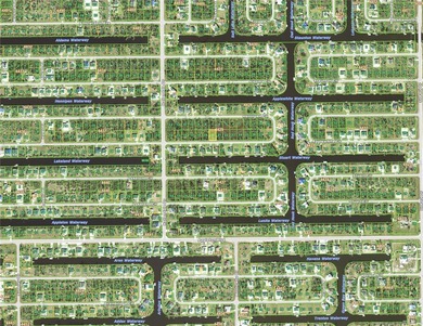 Across from the water located in the very special community of on Rotonda Golf and Country Club - Long Marsh  in Florida - for sale on GolfHomes.com, golf home, golf lot