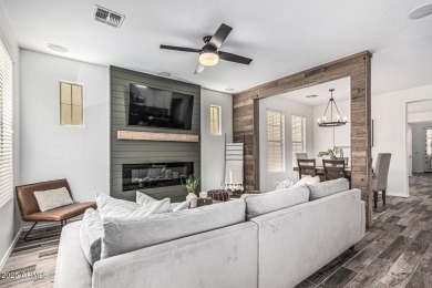 A beautifully crafted 4-bedroom, 2.5-bath Farmhouse-style home on Verrado Golf Club  in Arizona - for sale on GolfHomes.com, golf home, golf lot