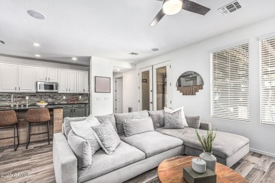 A beautifully crafted 4-bedroom, 2.5-bath Farmhouse-style home on Verrado Golf Club  in Arizona - for sale on GolfHomes.com, golf home, golf lot