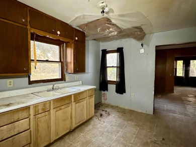 Discover a unique opportunity with this rural FIXER-UPPER on the on Sandstone Area Country Club in Minnesota - for sale on GolfHomes.com, golf home, golf lot