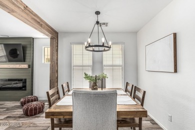 A beautifully crafted 4-bedroom, 2.5-bath Farmhouse-style home on Verrado Golf Club  in Arizona - for sale on GolfHomes.com, golf home, golf lot