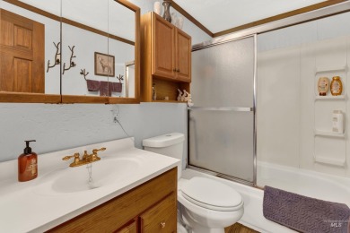Cedar Cabin in the woods walking distance to Terrace Lakes Golf on Terrace Lakes Golf Resort in Idaho - for sale on GolfHomes.com, golf home, golf lot