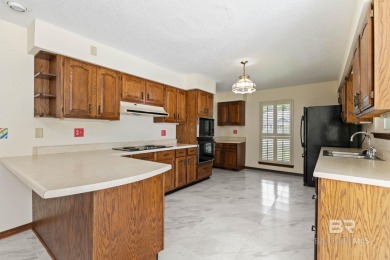 Welcome to this 3-bedroom, 2.5-bath Creole-style home located in on The Golf Club of the Wharf in Alabama - for sale on GolfHomes.com, golf home, golf lot