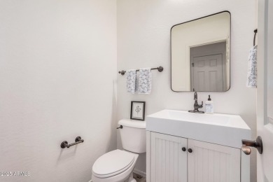 A beautifully crafted 4-bedroom, 2.5-bath Farmhouse-style home on Verrado Golf Club  in Arizona - for sale on GolfHomes.com, golf home, golf lot