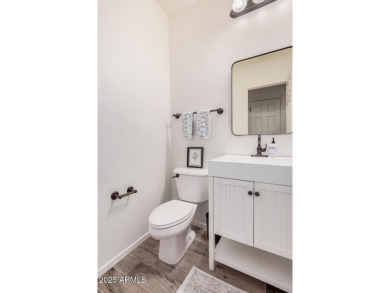 A beautifully crafted 4-bedroom, 2.5-bath Farmhouse-style home on Verrado Golf Club  in Arizona - for sale on GolfHomes.com, golf home, golf lot