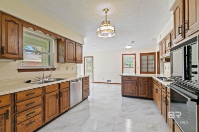 Welcome to this 3-bedroom, 2.5-bath Creole-style home located in on The Golf Club of the Wharf in Alabama - for sale on GolfHomes.com, golf home, golf lot