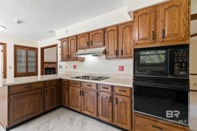 Welcome to this 3-bedroom, 2.5-bath Creole-style home located in on The Golf Club of the Wharf in Alabama - for sale on GolfHomes.com, golf home, golf lot
