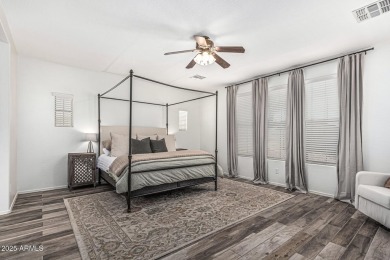 A beautifully crafted 4-bedroom, 2.5-bath Farmhouse-style home on Verrado Golf Club  in Arizona - for sale on GolfHomes.com, golf home, golf lot