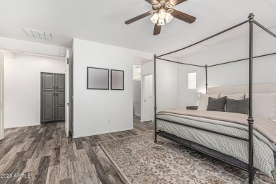 A beautifully crafted 4-bedroom, 2.5-bath Farmhouse-style home on Verrado Golf Club  in Arizona - for sale on GolfHomes.com, golf home, golf lot