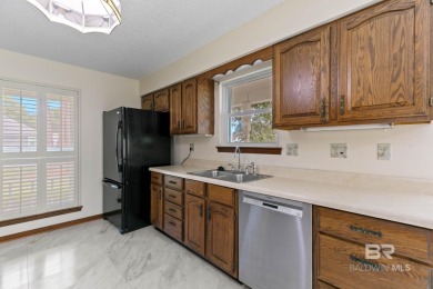 Welcome to this 3-bedroom, 2.5-bath Creole-style home located in on The Golf Club of the Wharf in Alabama - for sale on GolfHomes.com, golf home, golf lot