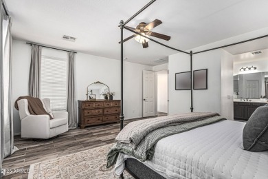 A beautifully crafted 4-bedroom, 2.5-bath Farmhouse-style home on Verrado Golf Club  in Arizona - for sale on GolfHomes.com, golf home, golf lot