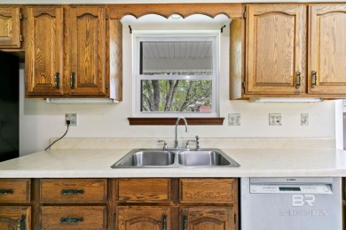 Welcome to this 3-bedroom, 2.5-bath Creole-style home located in on The Golf Club of the Wharf in Alabama - for sale on GolfHomes.com, golf home, golf lot