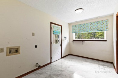 Welcome to this 3-bedroom, 2.5-bath Creole-style home located in on The Golf Club of the Wharf in Alabama - for sale on GolfHomes.com, golf home, golf lot