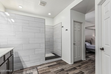 A beautifully crafted 4-bedroom, 2.5-bath Farmhouse-style home on Verrado Golf Club  in Arizona - for sale on GolfHomes.com, golf home, golf lot