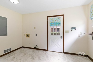Welcome to this 3-bedroom, 2.5-bath Creole-style home located in on The Golf Club of the Wharf in Alabama - for sale on GolfHomes.com, golf home, golf lot