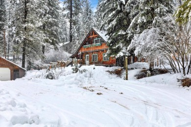 Cedar Cabin in the woods walking distance to Terrace Lakes Golf on Terrace Lakes Golf Resort in Idaho - for sale on GolfHomes.com, golf home, golf lot
